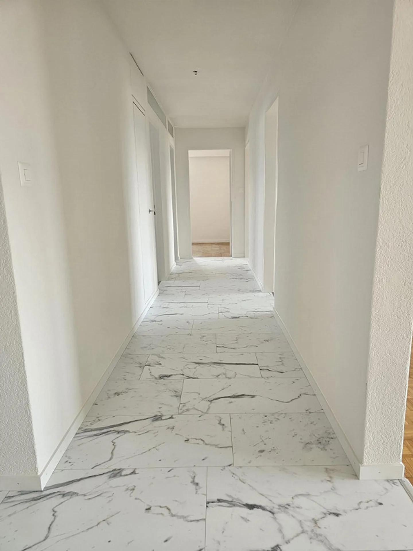 Living happiness in Gossau: Freshly renovated, central yet in the green! - Photo 1 of 9