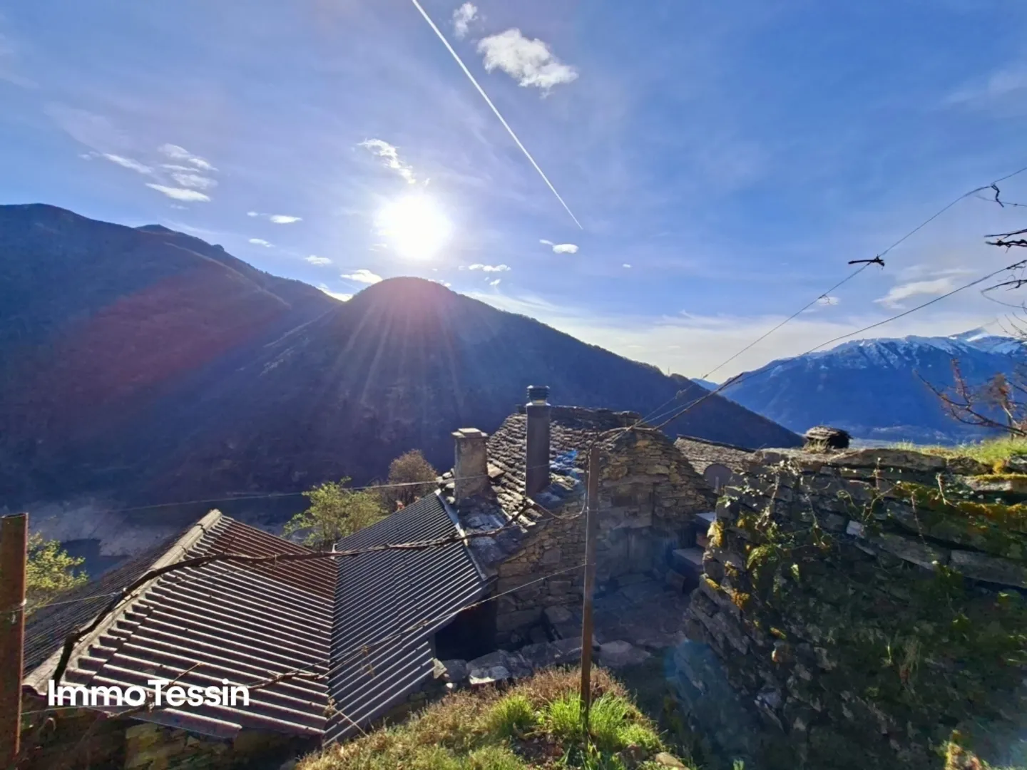 Charming and stylishly renovated dream rustic house with a view of the Verzasca dam and 5800 m2 of natural land - Photo 1 of 13