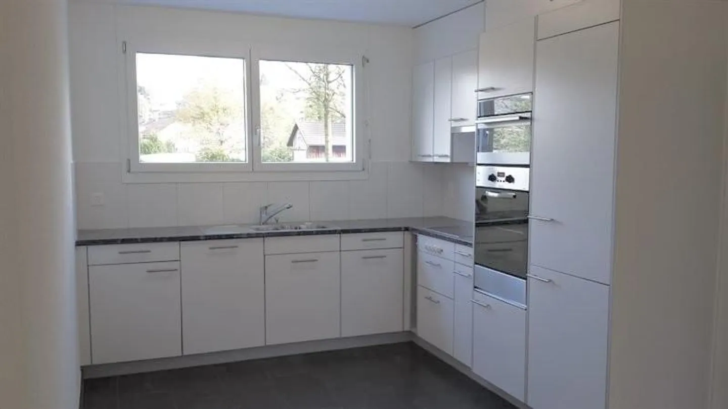 Modern and centrally located living - Photo 4 of 7