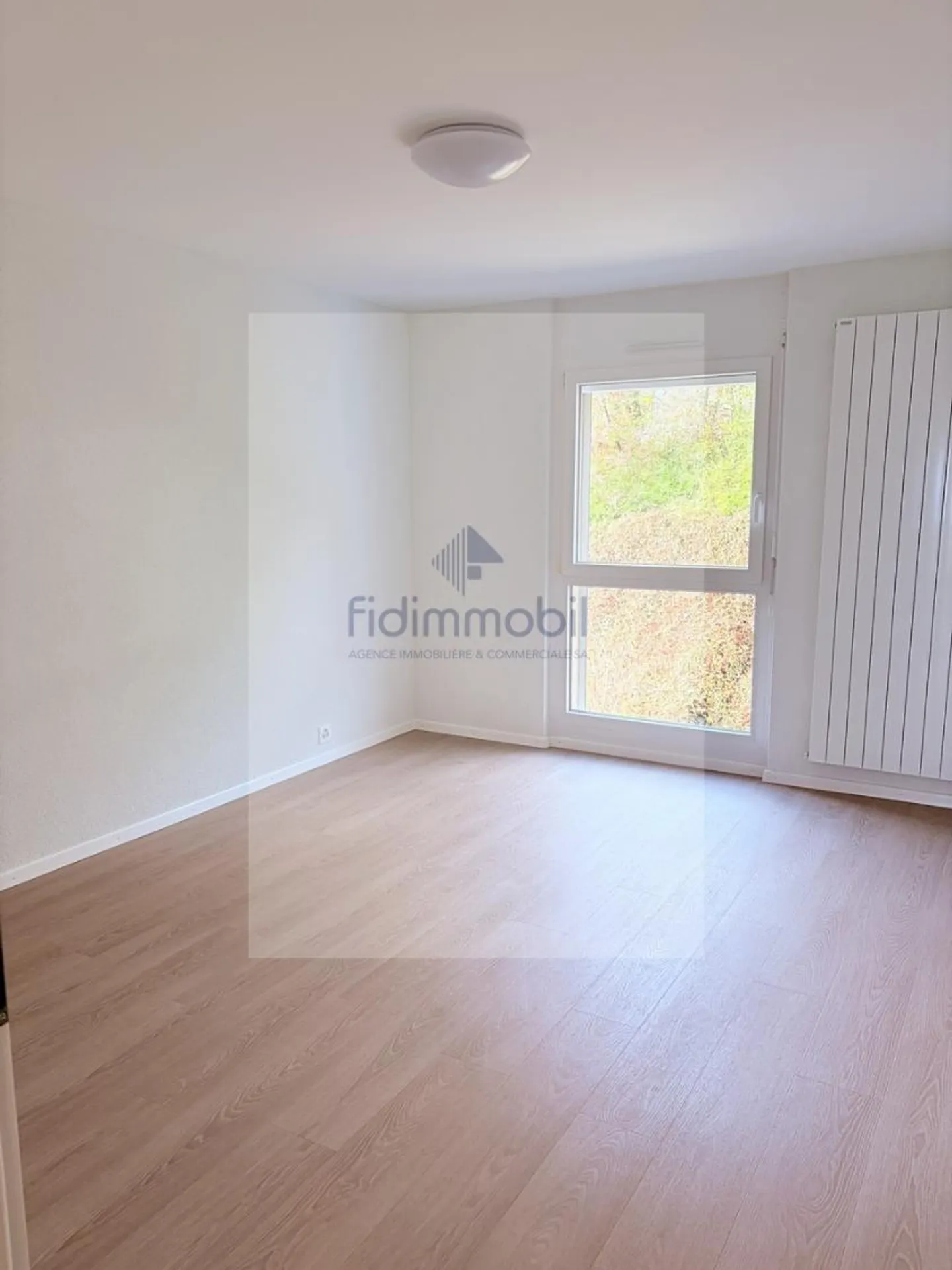 Charmant appartement 2.5 pièces - Photo 5 sur 5