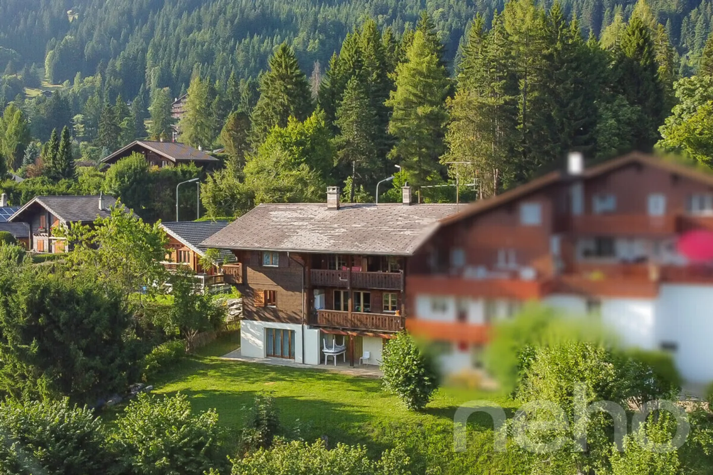 Chalet mit 4 Wohnungen in Villars - Foto 1 von 12