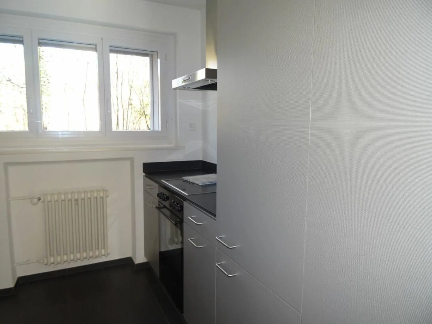 3.5 Zimmer-Wohnung mit Sitzplatz - Foto 1 von 8