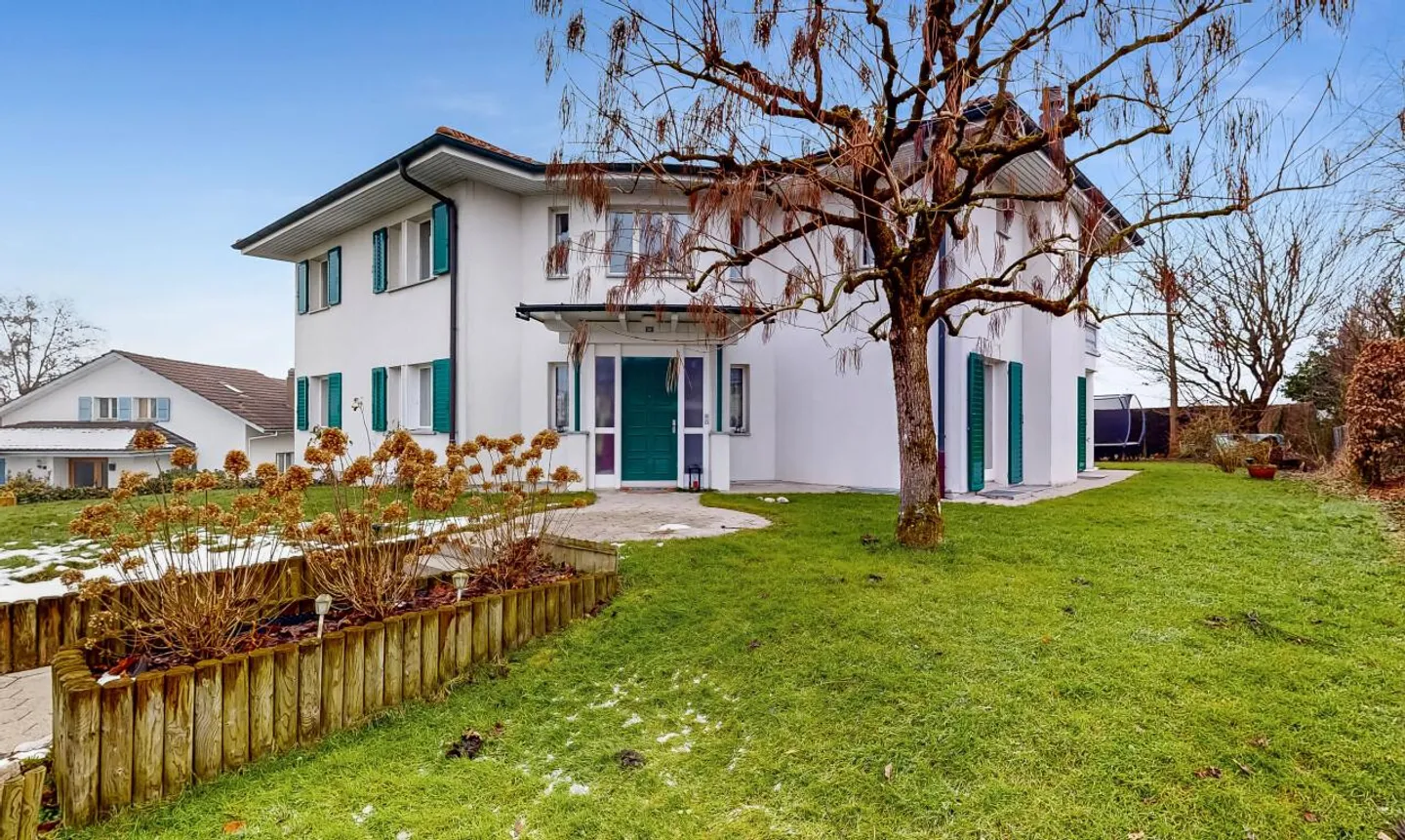 Geräumiges Einfamilienhaus mit Garten - Foto 1 von 11