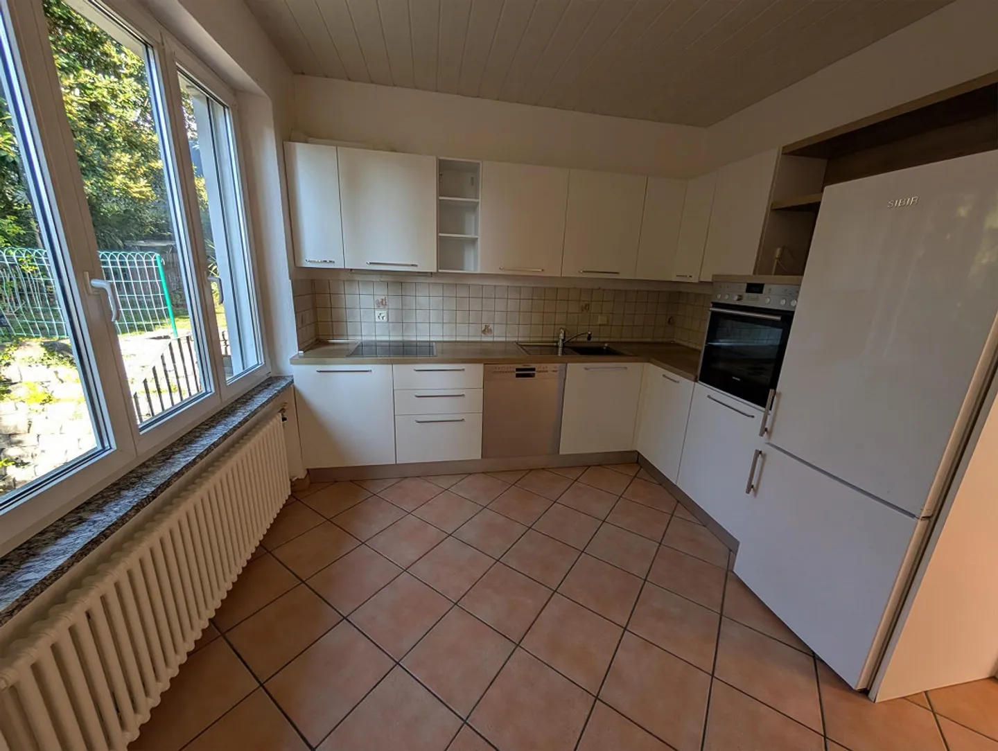 Luminoso appartamento di 4 stanze a Ruvigliana con vista sul lago - Foto 4 di 10