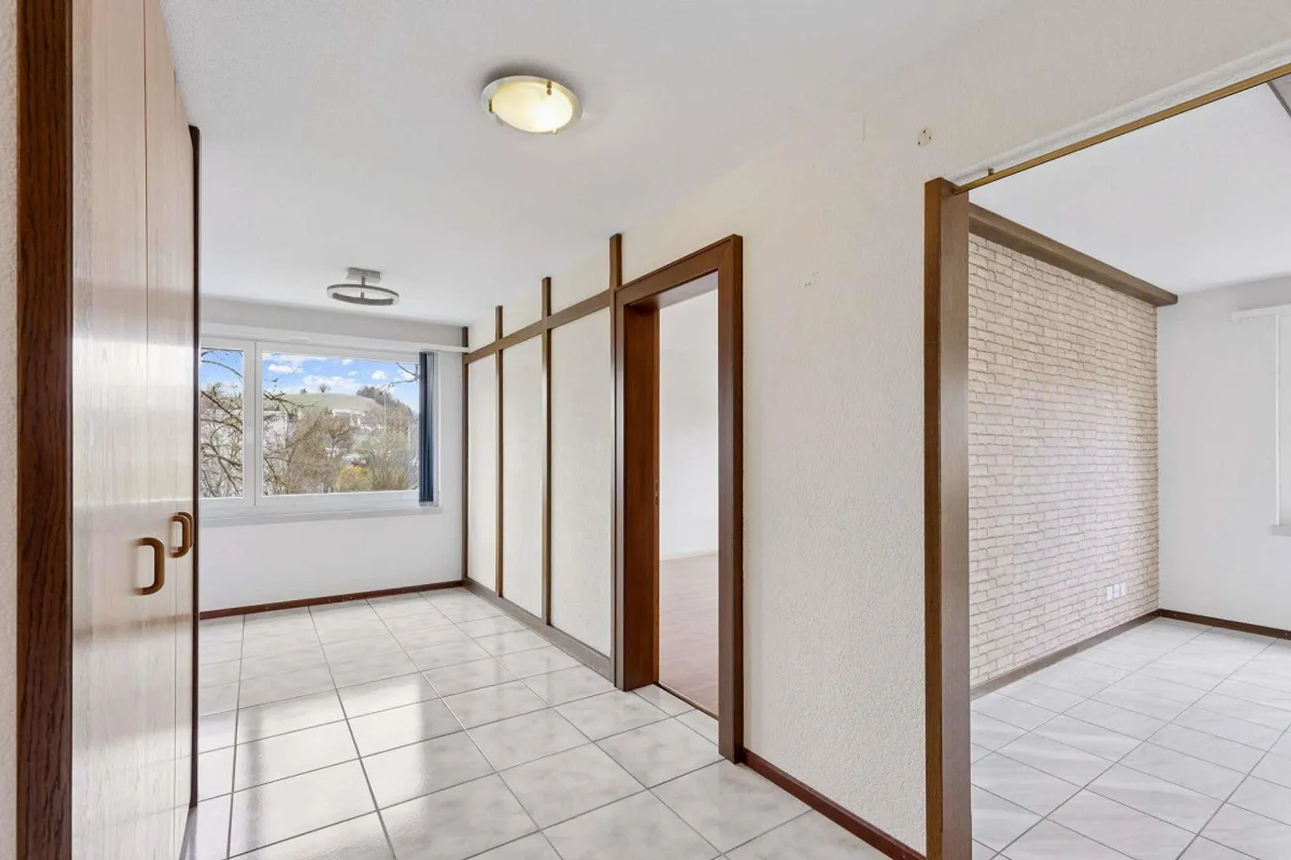 Appartement en copropriété de 4,5 pièces dans un quartier familial - Photo 2 sur 11