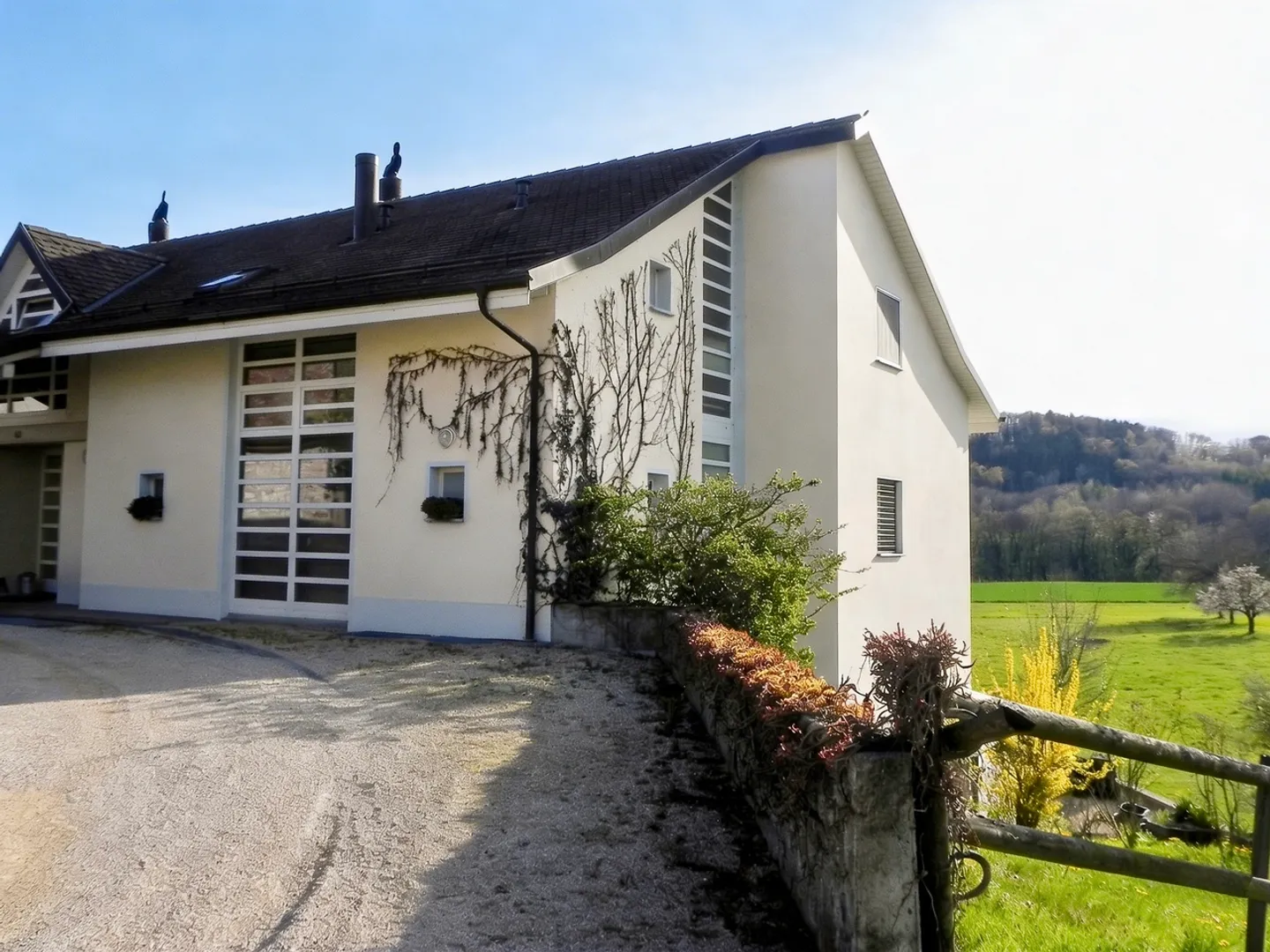 Lichtdurchflutetes Reihenhaus in Villars-sous-Yens - Foto 1 von 11