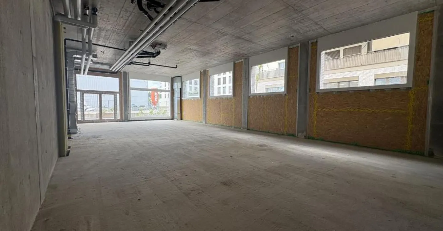 Gewerbefläche zur Miete im neuen Öko-Viertel in Marly! - Foto 2 von 5
