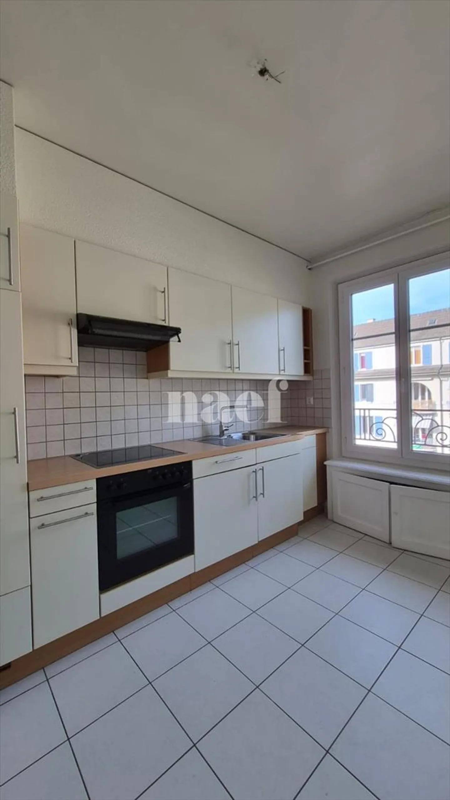 Appartement de trois pièces au 4ème étage, rue de l'Eglise 6, 2000 Neuchâtel - Photo 5 sur 7