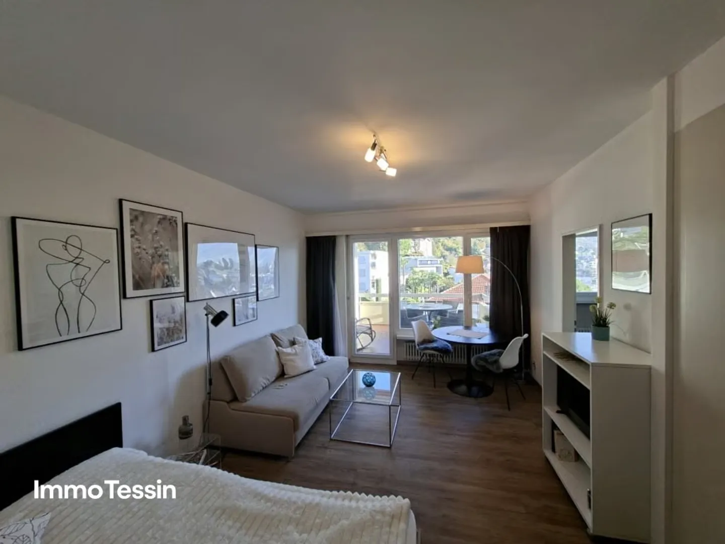 Appartamento di 1.5 locali in posizione centrale a Muralto con vista mozzafiato sul lago, piscina interna e posto auto - Foto 4 di 13