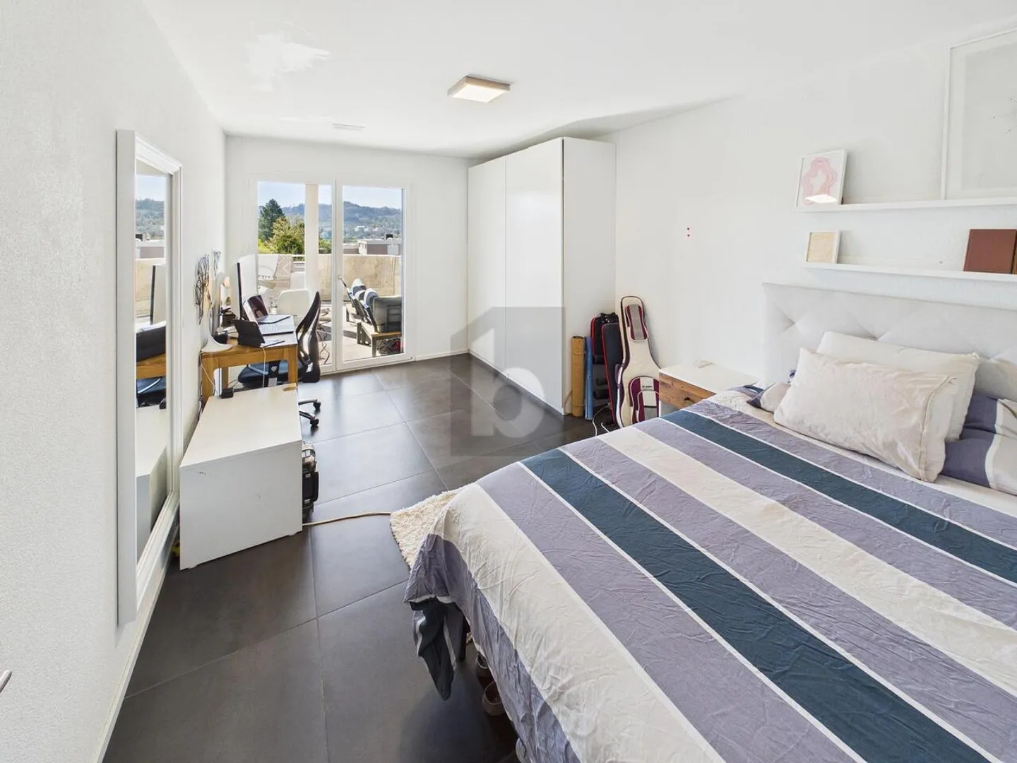 Stilvolle Wohnung mit sonniger Terrasse - Foto 5 von 6