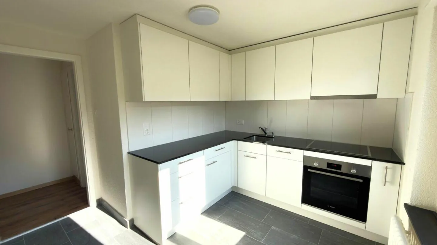 Appartement 4.5 pièces entièrement rénové - Photo 2 sur 12
