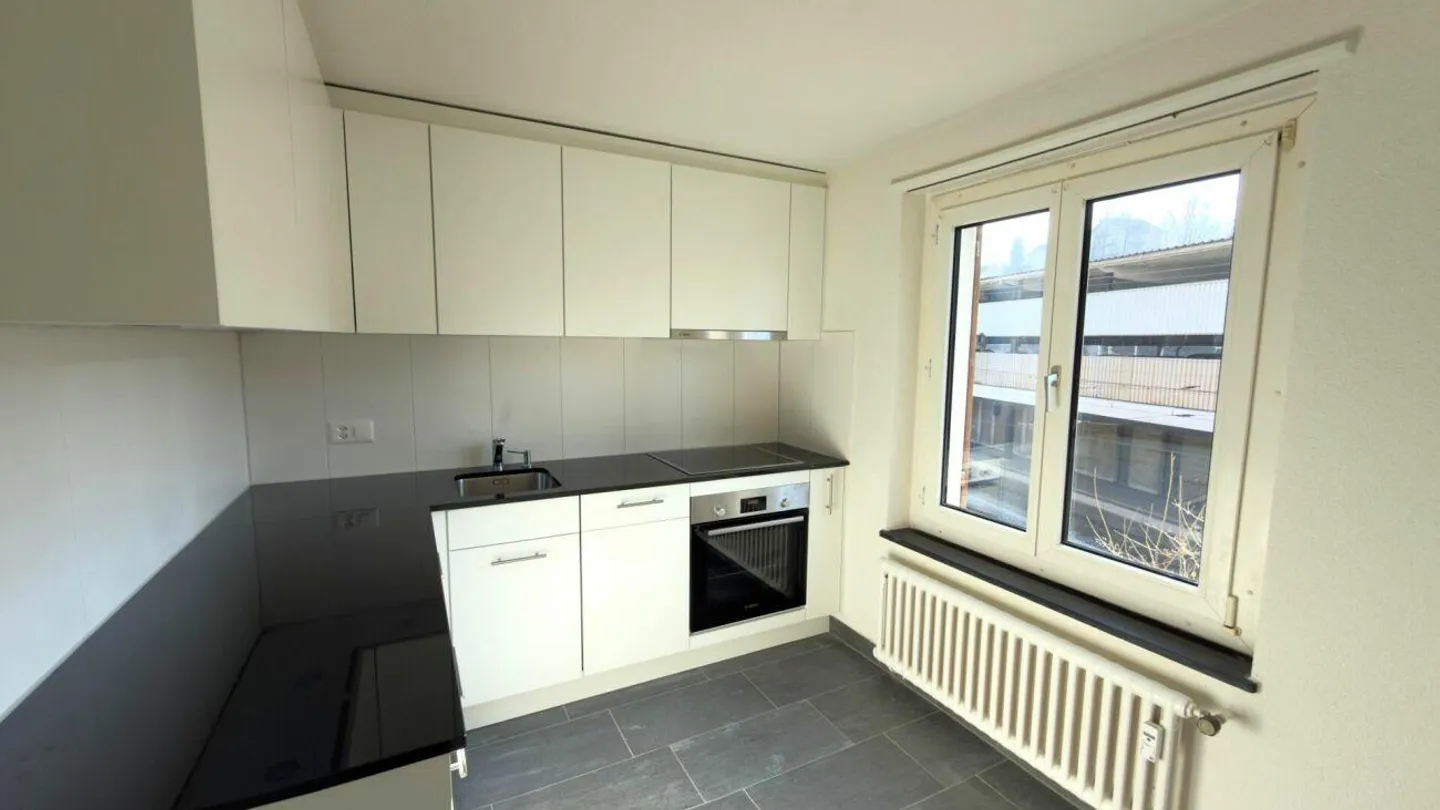 Appartement 4.5 pièces entièrement rénové - Photo 3 sur 12
