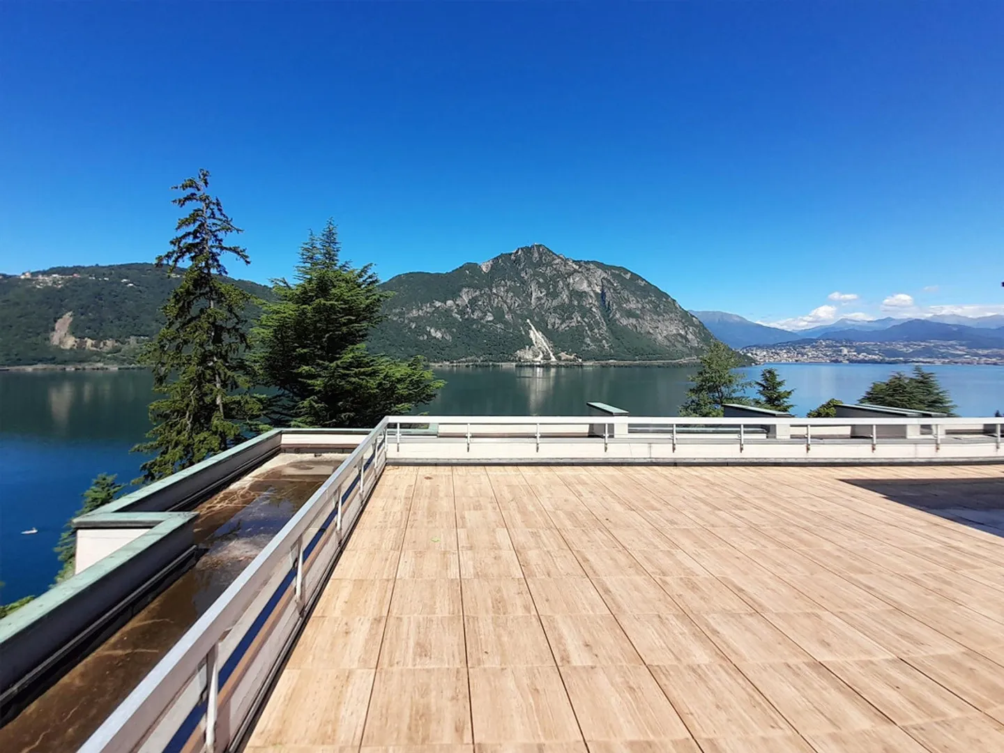 À louer appartement 2,5 pièces avec jardin, piscine et vue sur le lac à Bissone - Photo 8 sur 9