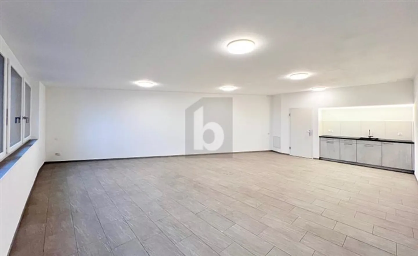 CENTRALLY LOCATED WITH LARGE WINDOW FRONT - Photo 1 of 6