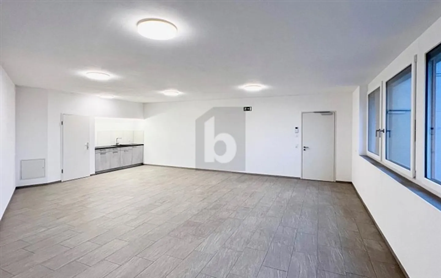 CENTRALLY LOCATED WITH LARGE WINDOW FRONT - Photo 2 of 6