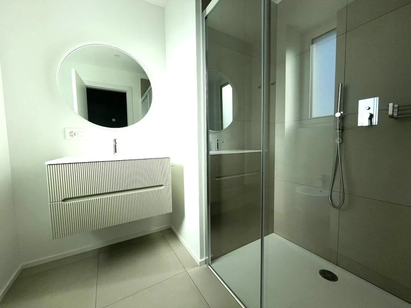 THE PLEASURE OF LIVING IN THE NEW 3.5 ROOMS WITH PRIVATE GARDEN - Photo 9 of 11