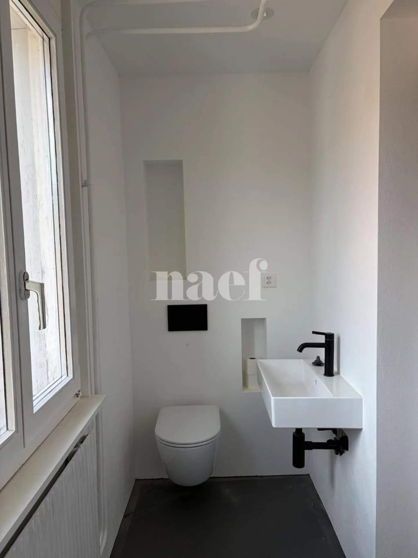 Charming renovated apartment in the heart of Landeron - Photo 3 of 5