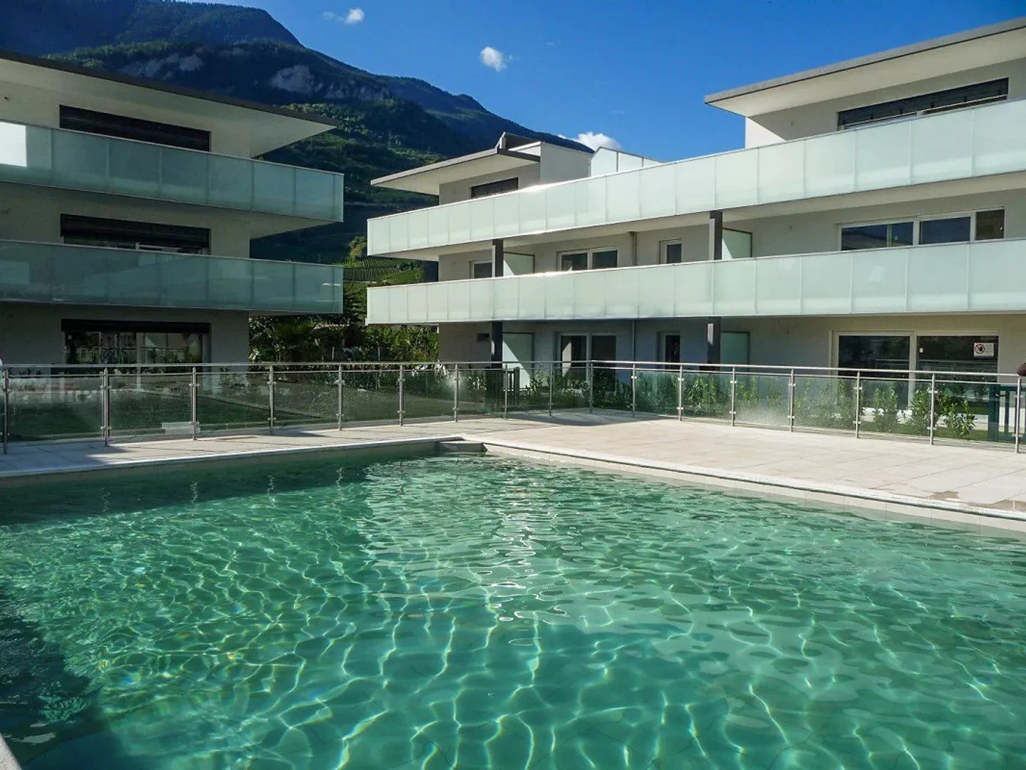 Modern Apartment with Pool - Photo 1 of 13