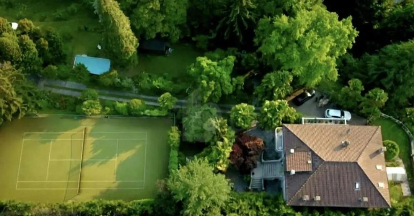 WITH PRIVATE PARK AND TENNIS COURT - Photo 1 of 6