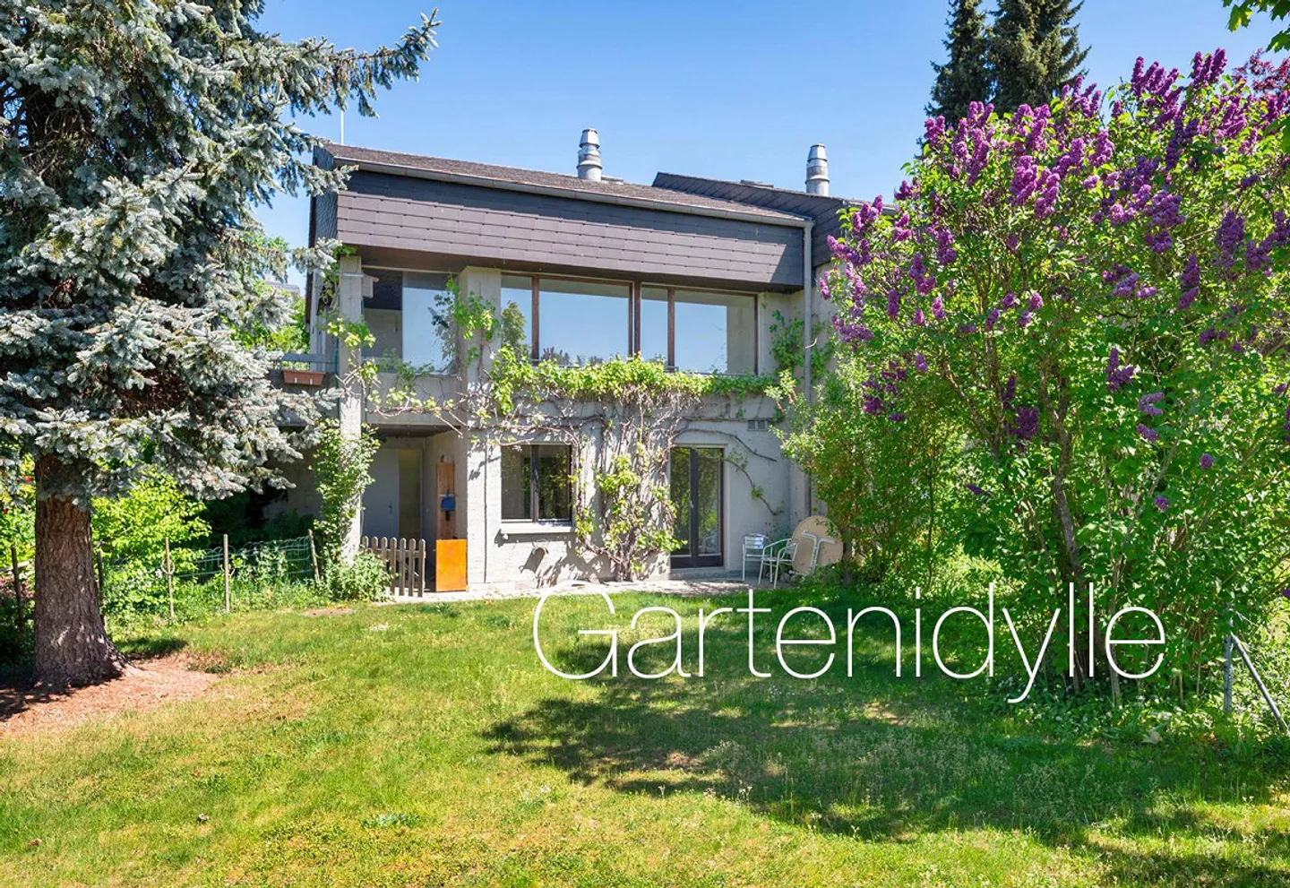 Living in the Garden Idyl on the Best South Slope Location - Photo 1 of 15