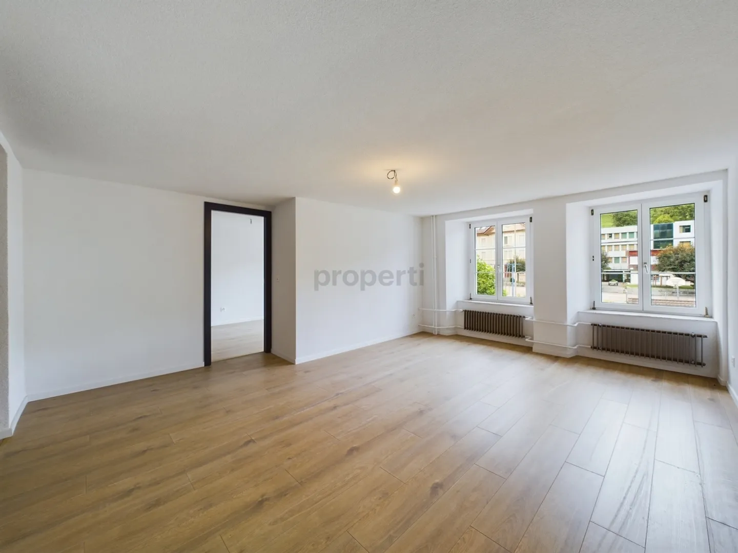 Attractive multi-family house with a gross yield of 6% - Photo 2 of 11
