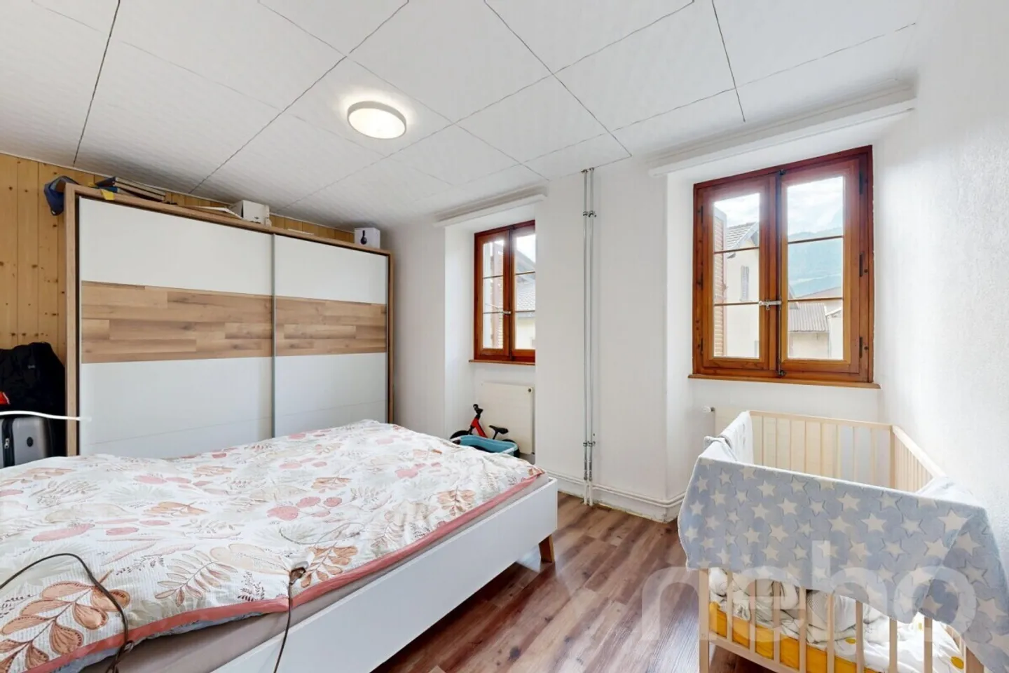 Gebäude mit 2 Wohnungen 3.5 + 1 Dachgeschoss 3.5 vollständig renoviert. - Foto 10 von 12