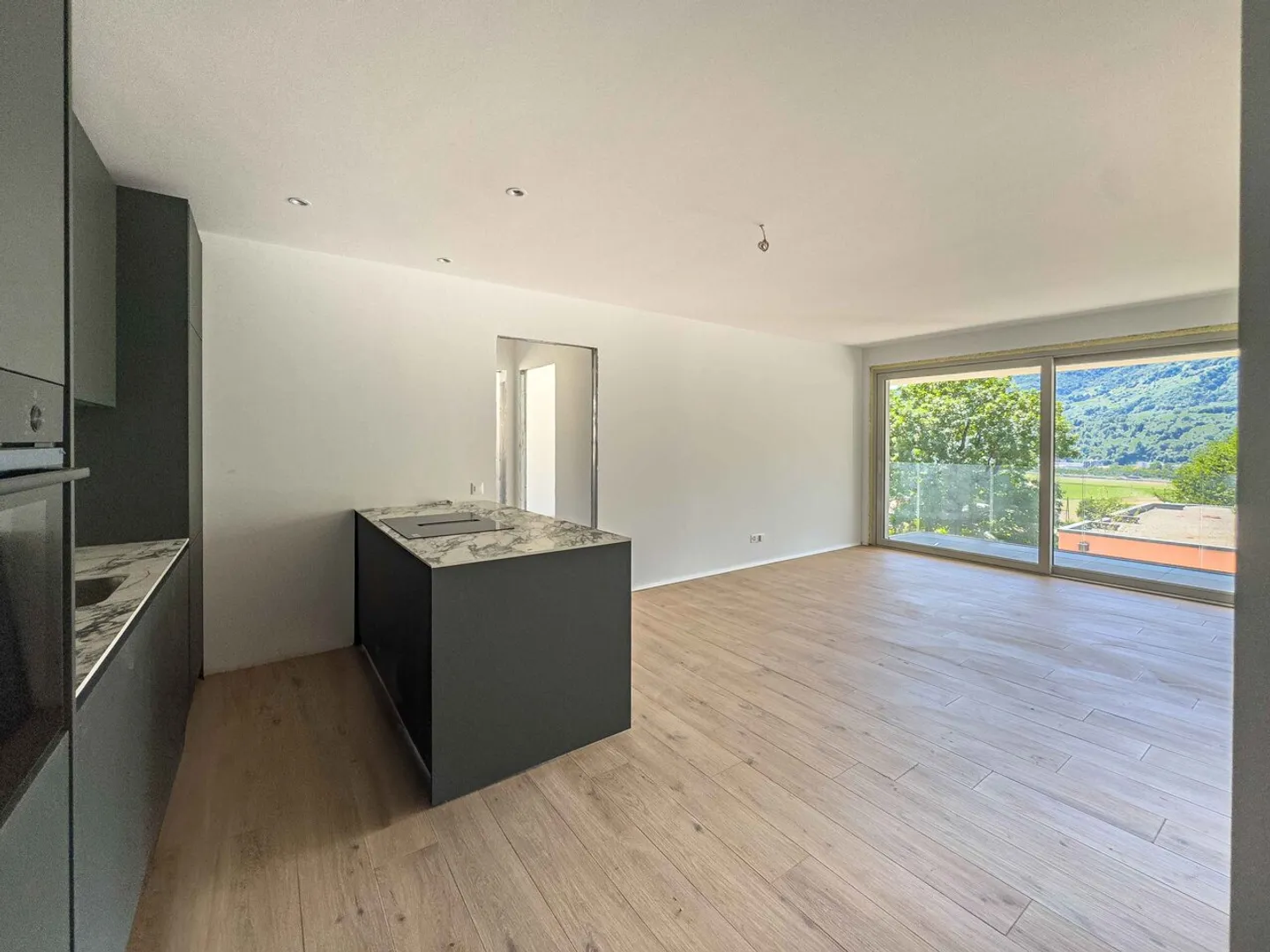 Neue 2,5 Zimmer mit Terrasse in Vezia - Foto 2 von 8