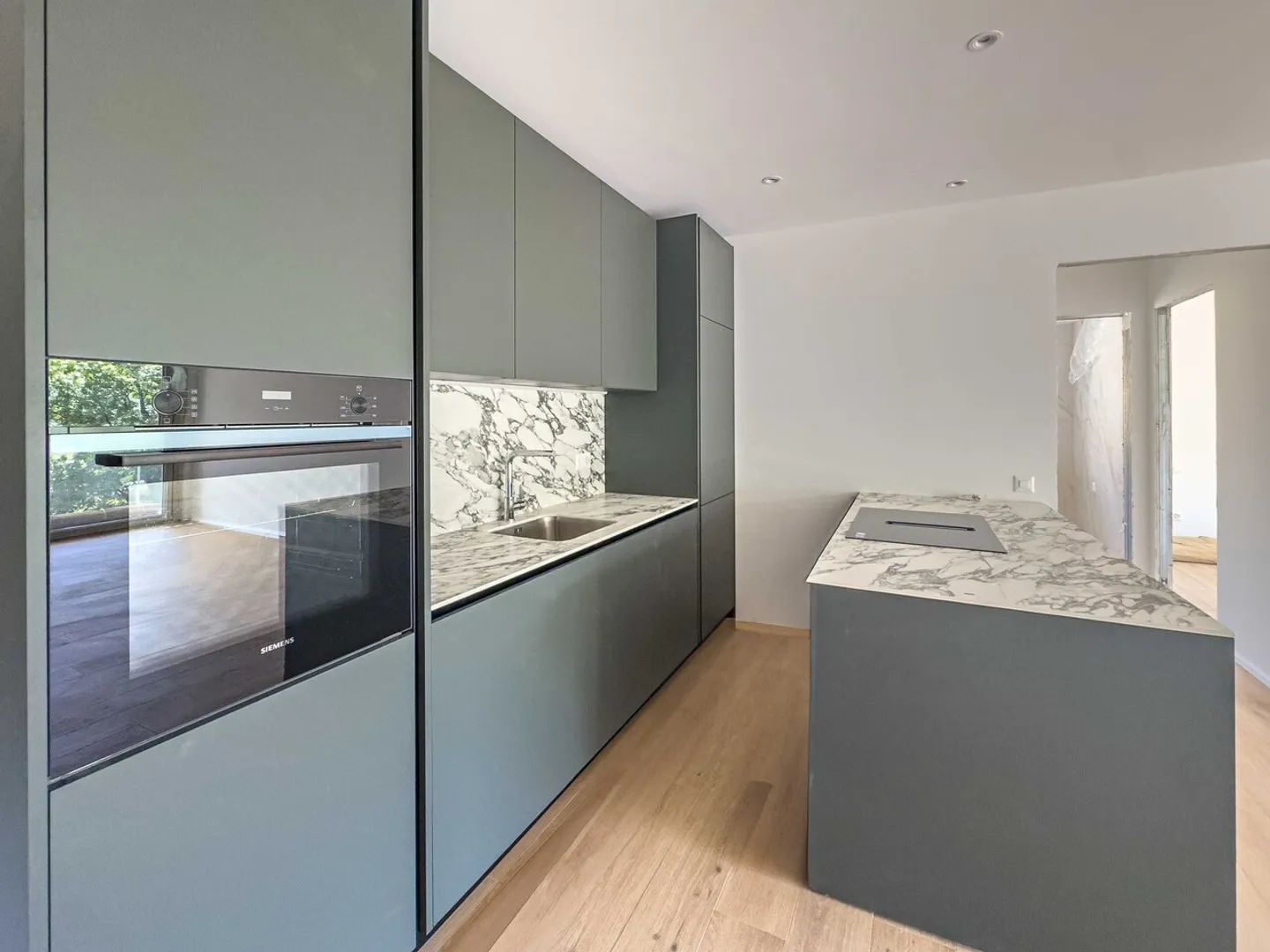 Neue 2,5 Zimmer mit Terrasse in Vezia - Foto 3 von 8