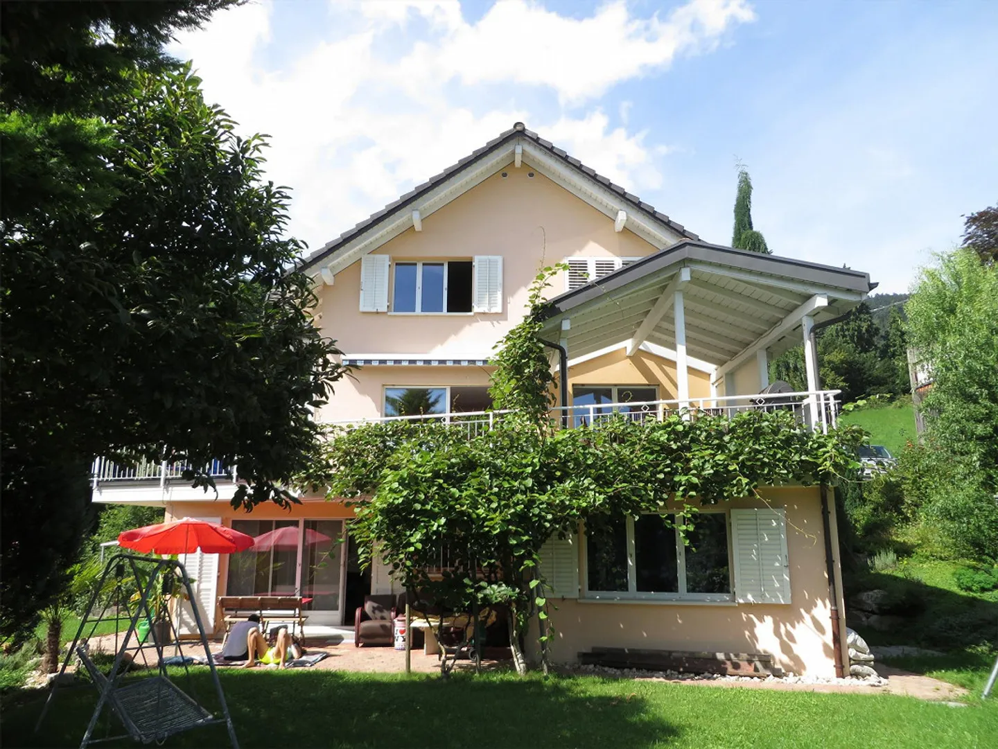 Maison individuelle attrayante avec appartement séparé et belle vue - Photo 1 sur 17