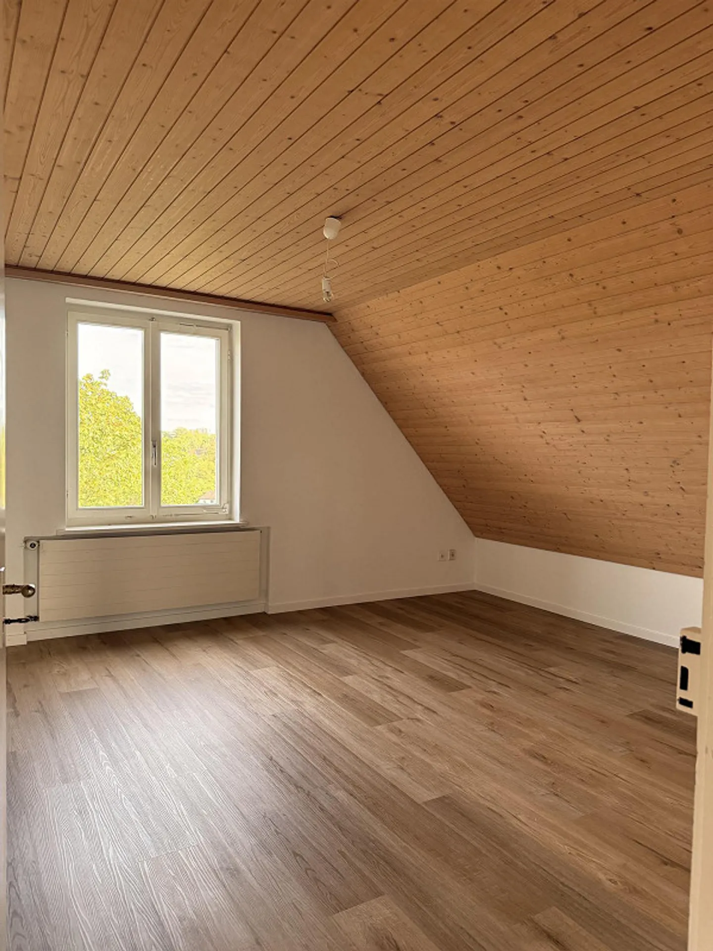City-Close Attic Apartment in the Green - Photo 3 of 6