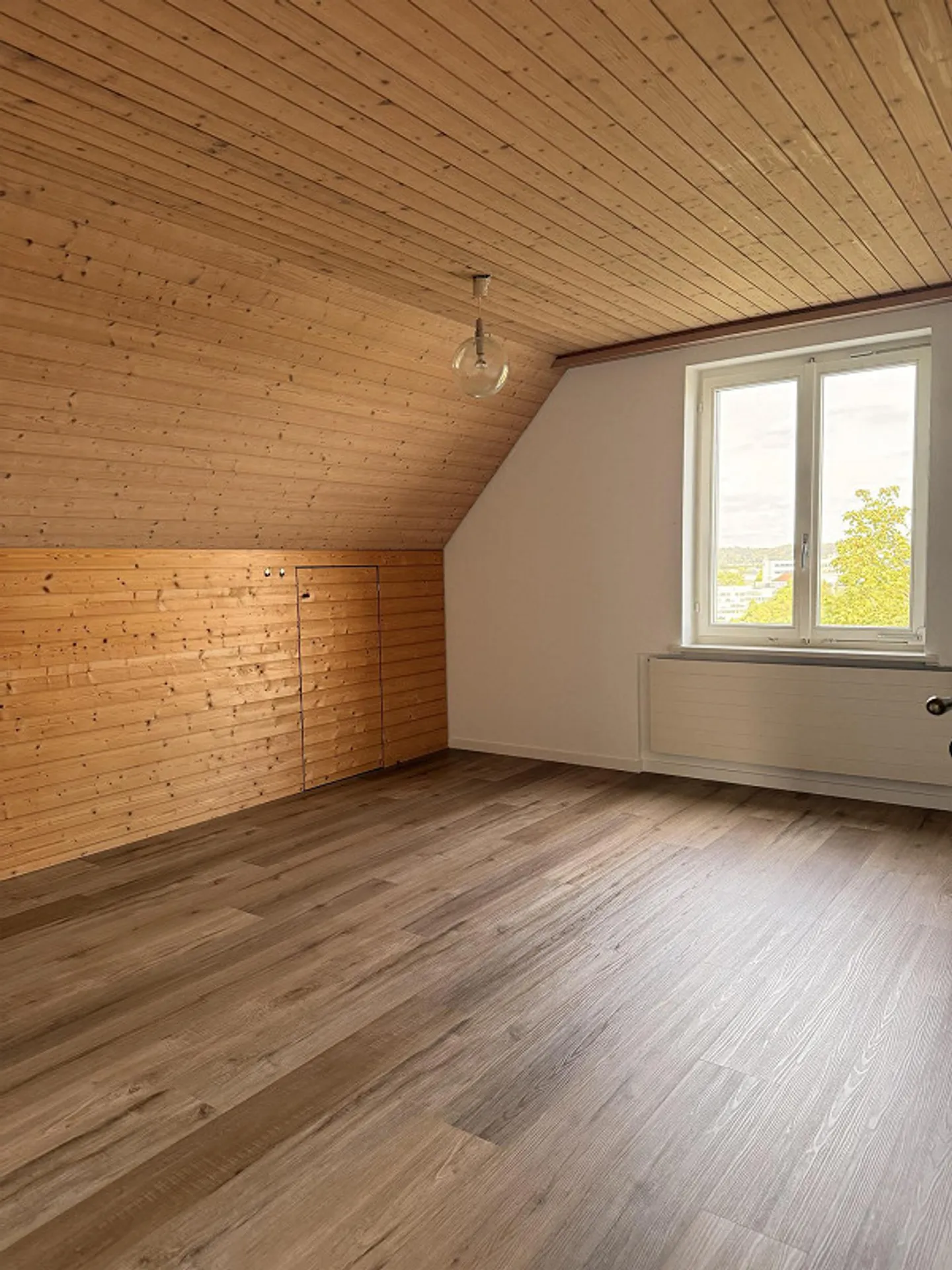 City-Close Attic Apartment in the Green - Photo 4 of 6