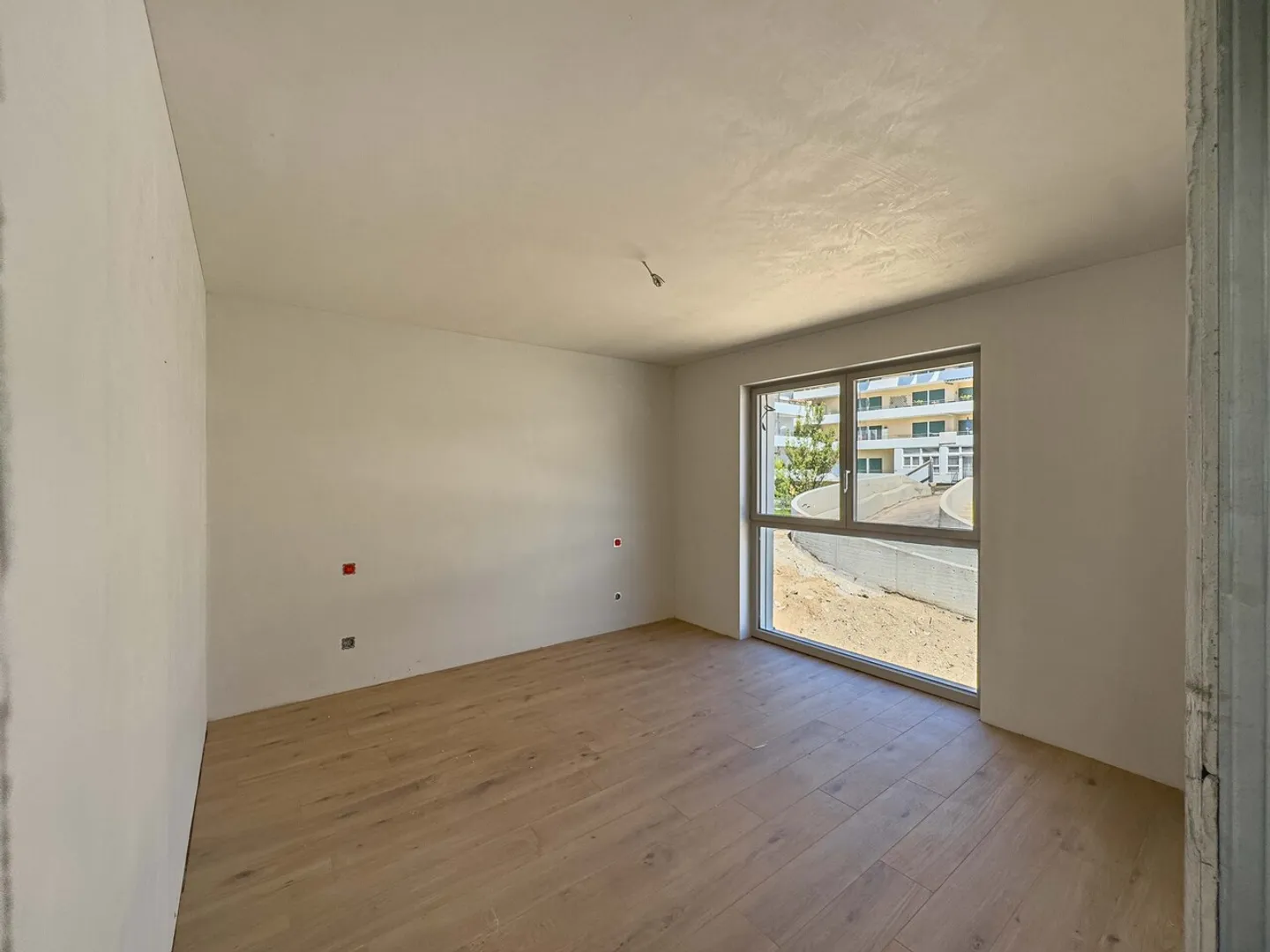 Neubauwohnung in Vezia - Foto 5 von 11