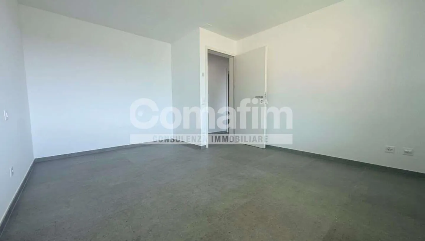 MODERNO APPARTAMENTO DUPLEX CON AMPIO GIARDINO PRIVATO - Foto 5 von 11