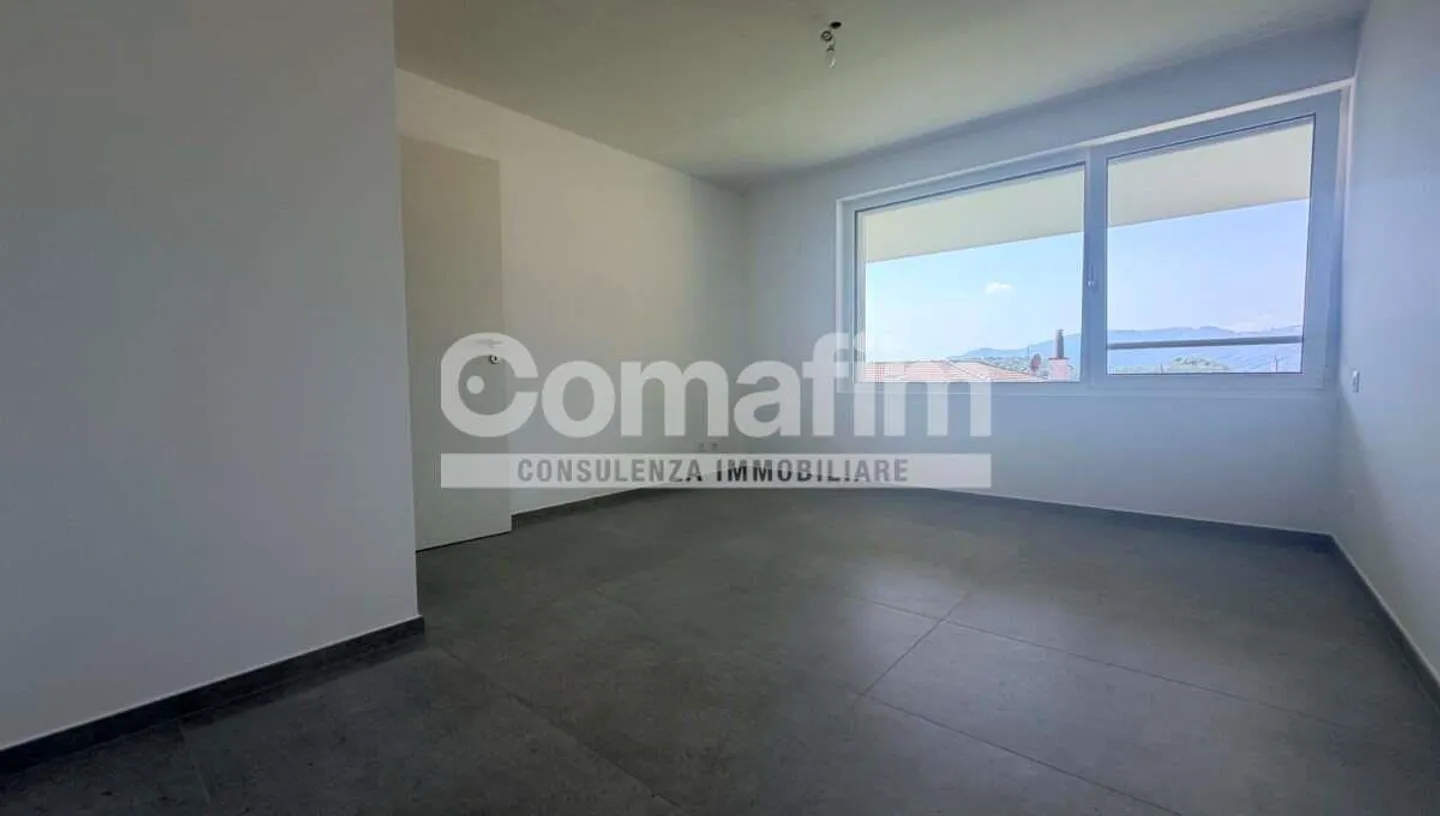 MODERNO APPARTAMENTO DUPLEX CON AMPIO GIARDINO PRIVATO - Foto 6 von 11