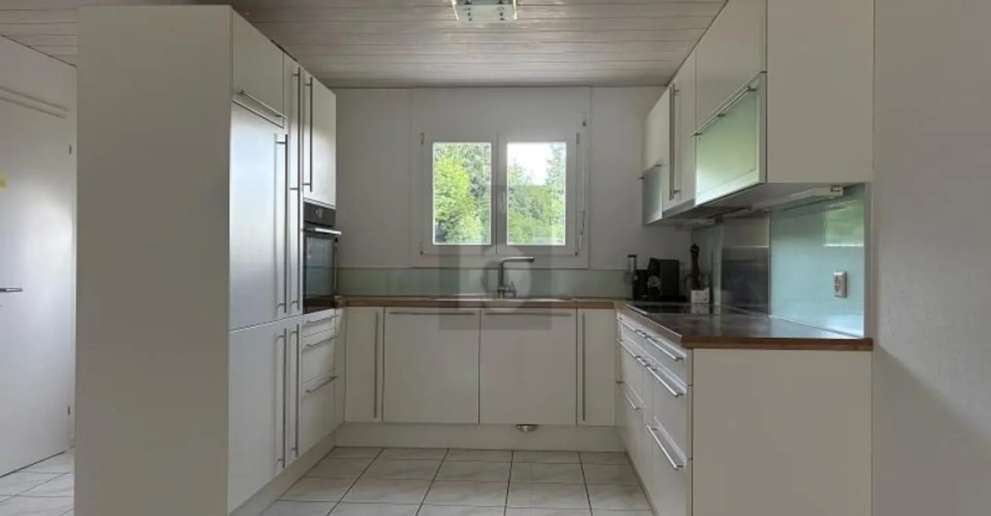 Maison familiale avec jardin - Photo 4 sur 6