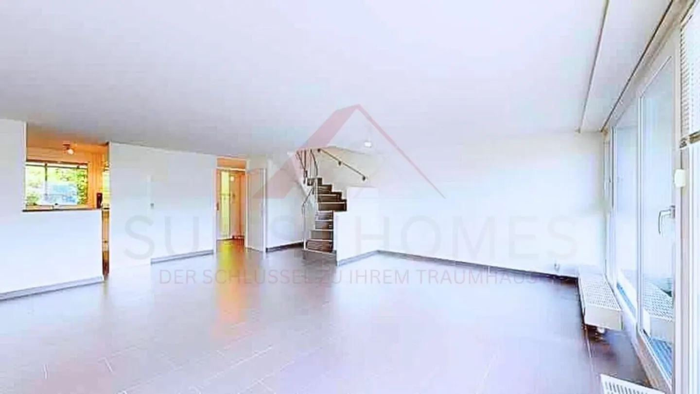 Spacious Maisonette Apartment on the 6th Floor with Unobstructed View - Photo 5 of 12