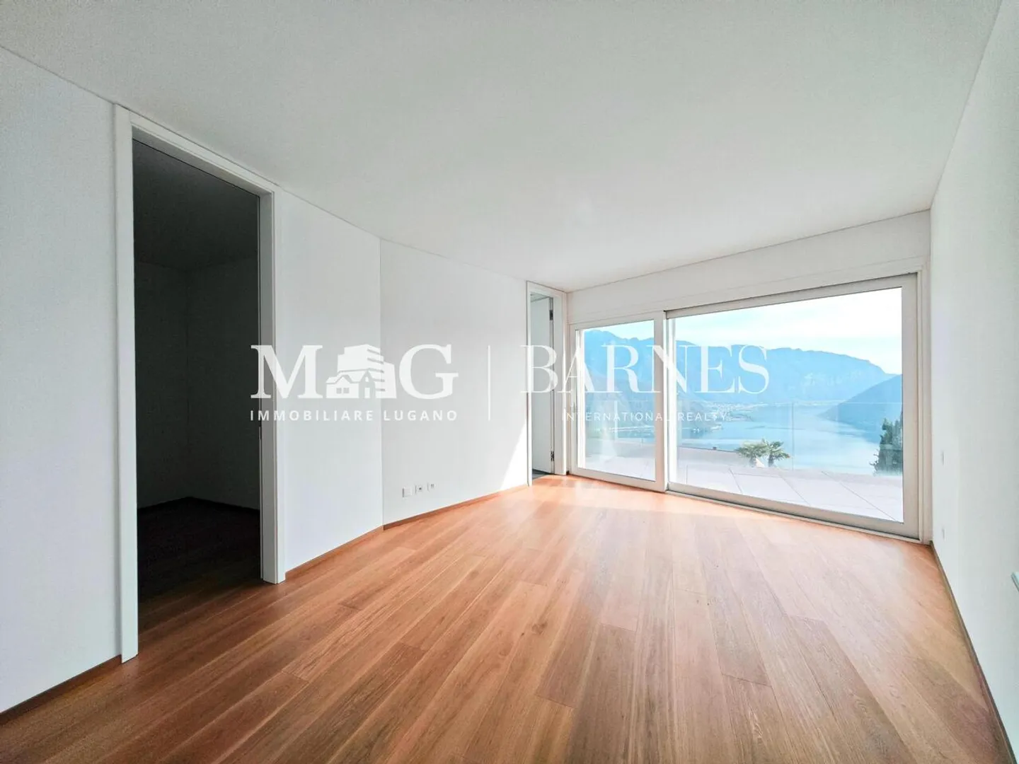 Lugano, Carona : Attique 5.5 pièces avec vue sur le lac et grande terrasse - Photo 12 sur 13