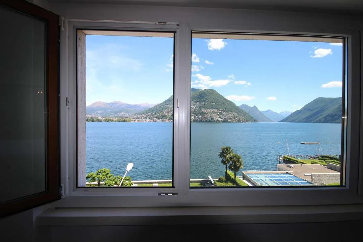 Elegante appartamento di 3,5 stanze con vista lago e terrazze - Foto 3 di 13