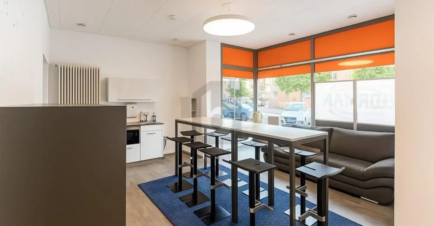 MODERN AND IDEALLY LOCATED - Photo 3 of 6