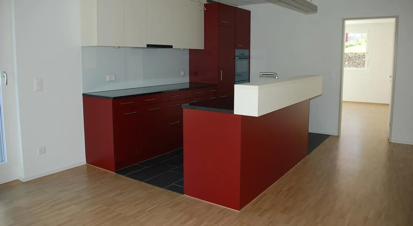 Moderne Dachwohnung mit Balkon - Foto 3 von 12