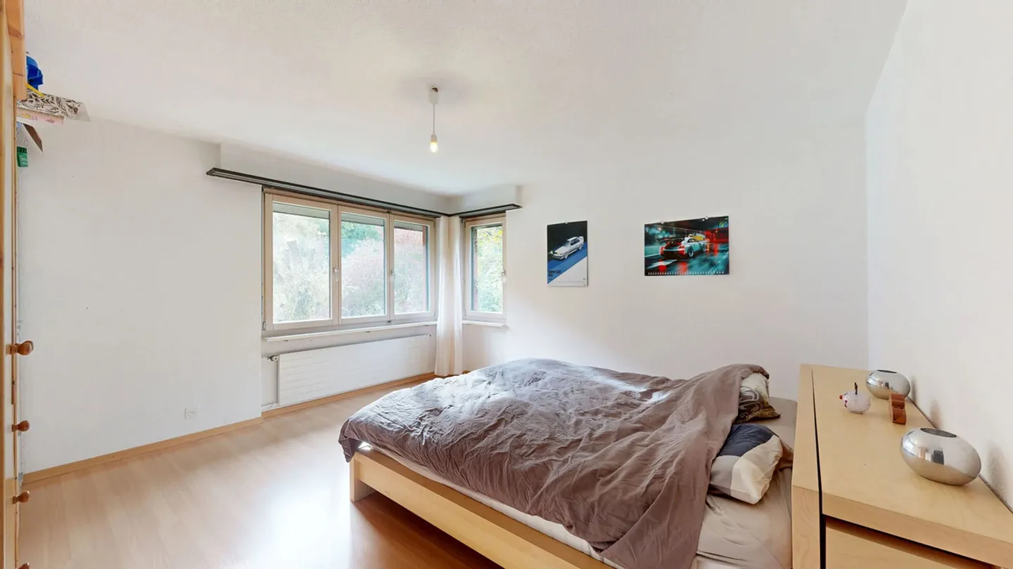 Maison multifamiliale avec trois appartements et trois places de parking extérieures - Photo 19 sur 29