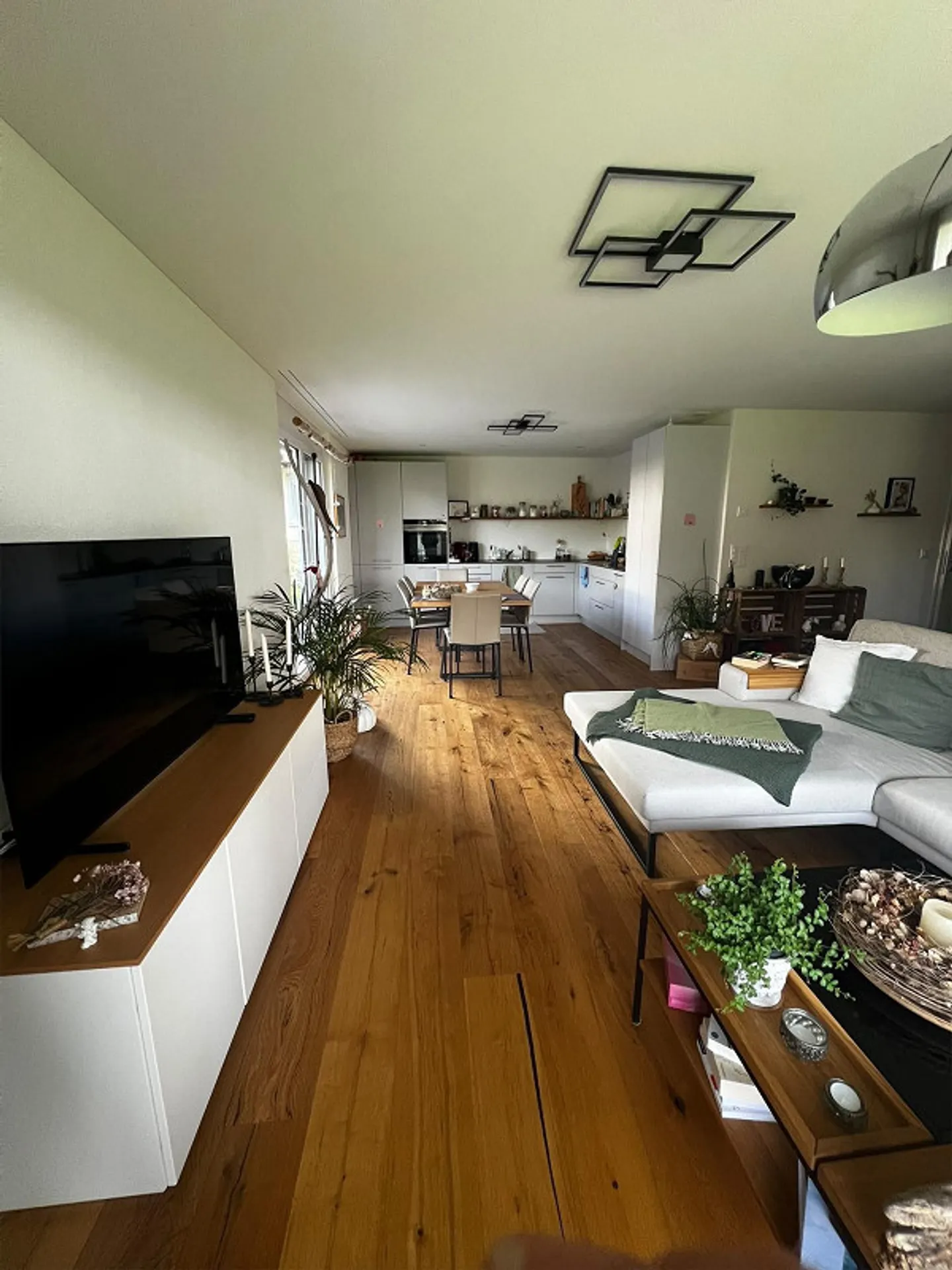 Modern 3.5-room garden apartment with covered seating area - Photo 2 of 10