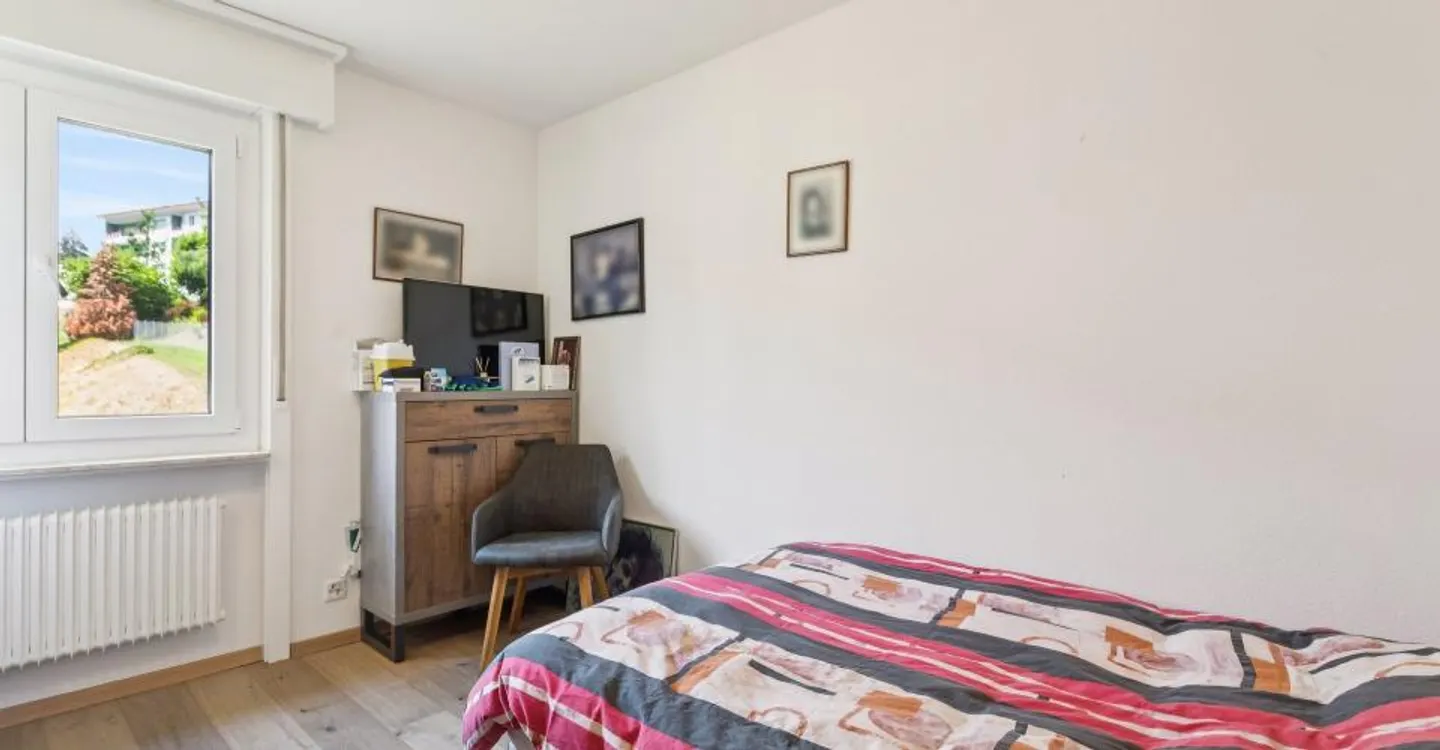 Un appartement rénové de 5.5 pièces au cœur de Villars-sur-Glâne - Photo 3 of 9