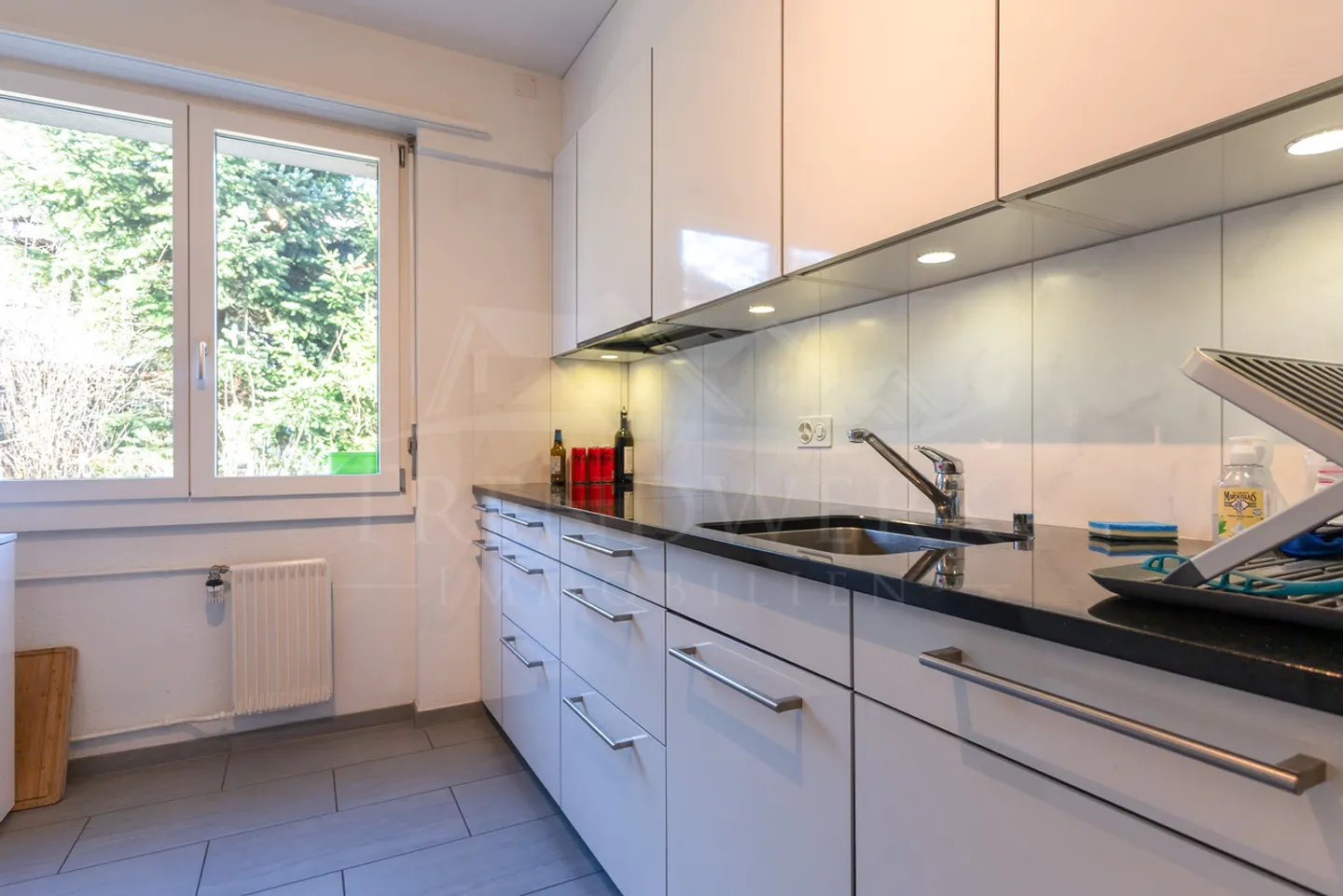 Fully rented multi-family house with 4 apartments in Ittigen - Photo 3 of 16