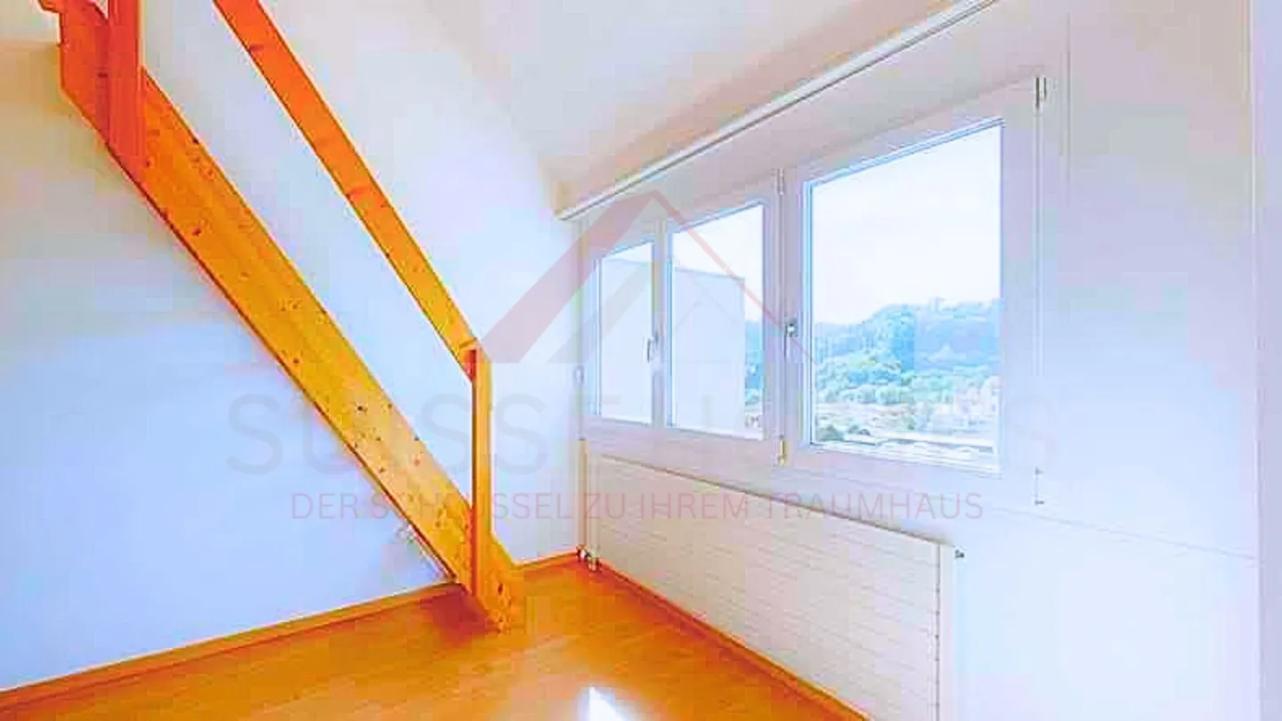 Spacious Maisonette Apartment on the 6th Floor with Unobstructed View - Photo 9 of 12