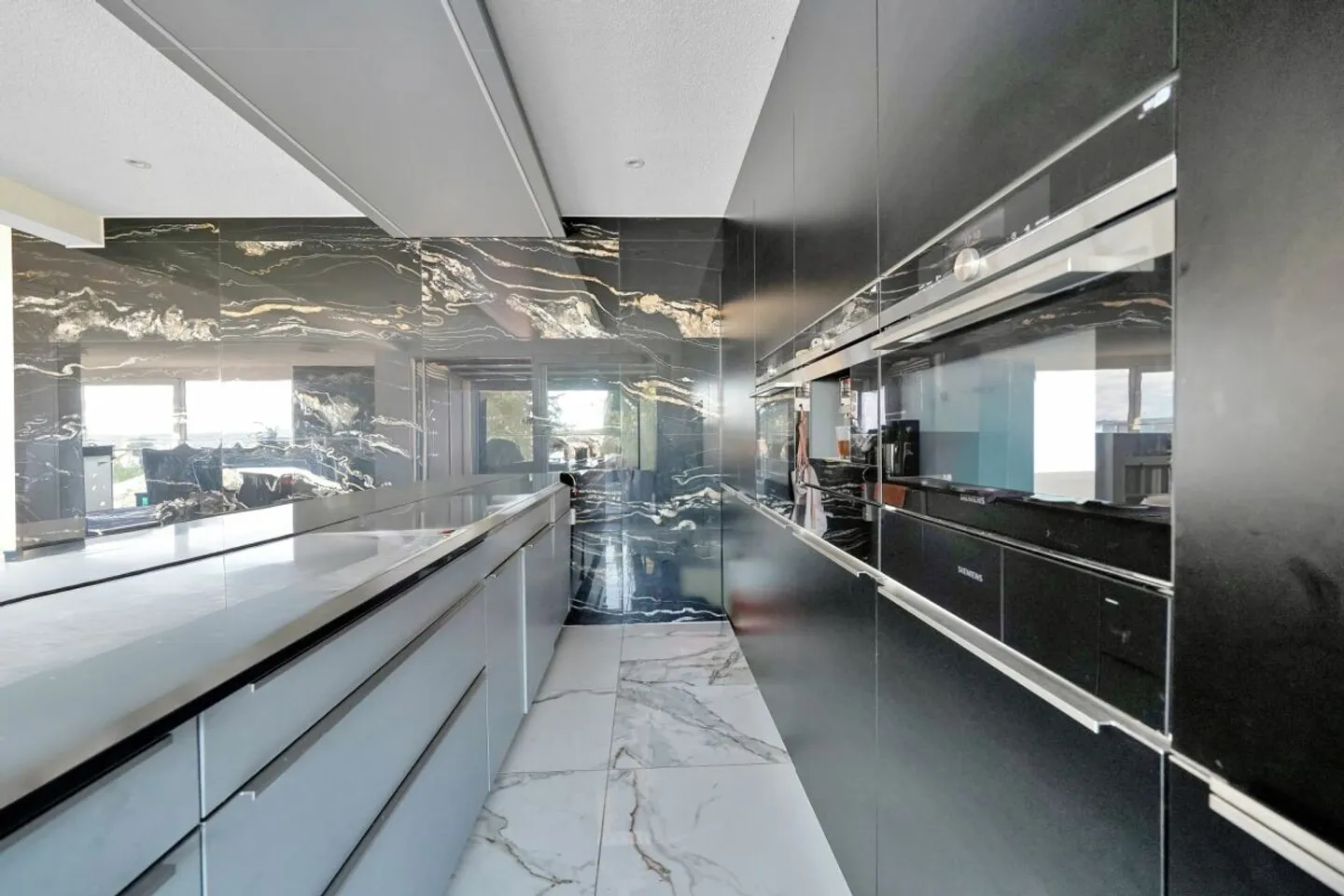 Renovated multi-family house with 5 residential units and parking garage - Photo 11 of 13