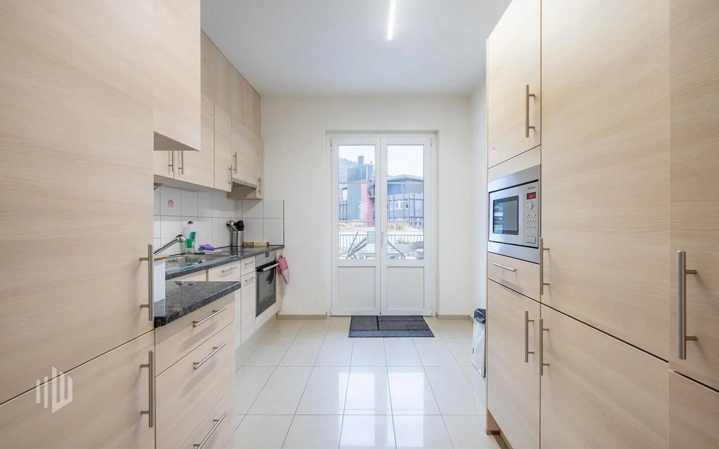 ImmoWyss - Attractive multi-family house with commercial premises - Photo 4 of 8