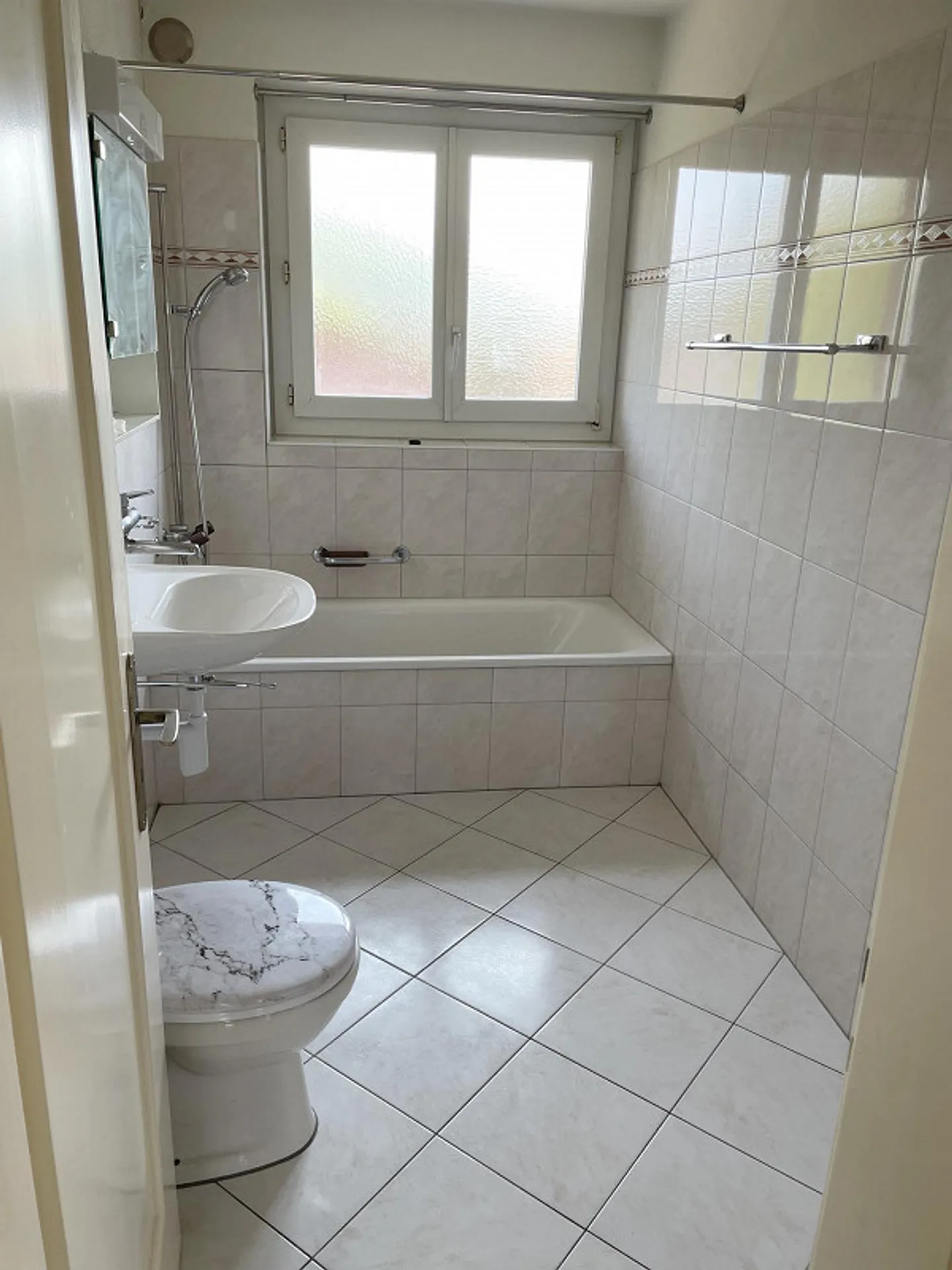 Appartement pratique près de la ville - Photo 5 sur 5