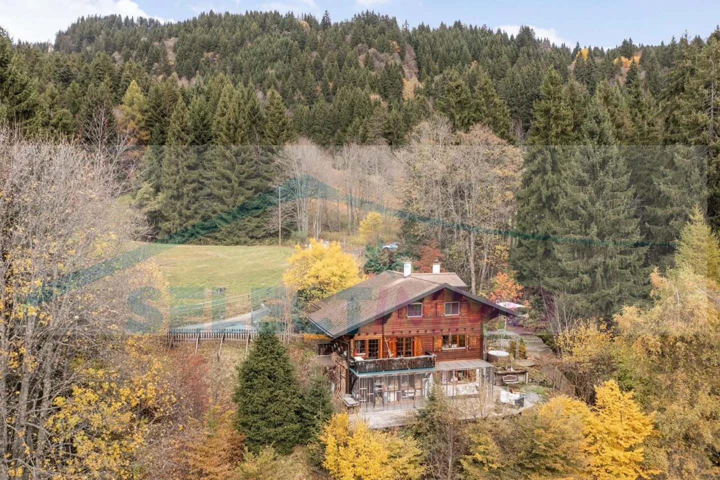 This warm chalet nestled in the heart of nature, quiet and sheltered from prying eyes, also benefits from a magnificent panorama and optimal sunshine - Photo 1 of 14