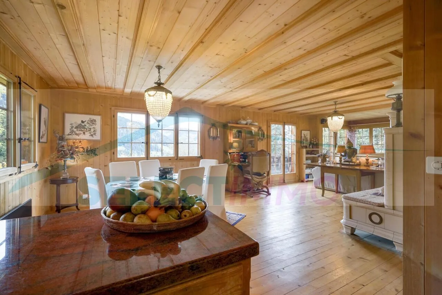 This warm chalet nestled in the heart of nature, quiet and sheltered from prying eyes, also benefits from a magnificent panorama and optimal sunshine - Photo 6 of 14